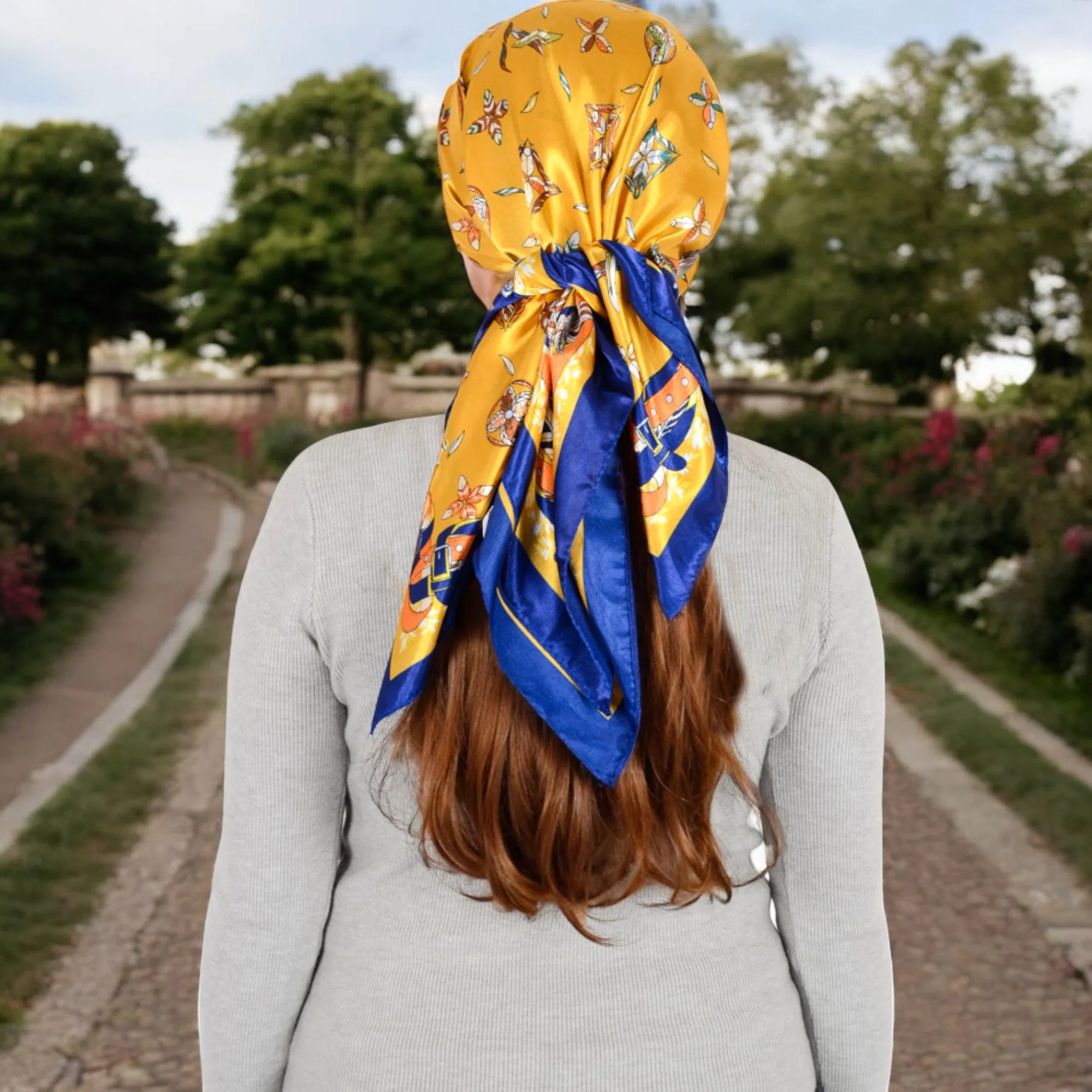 Women's Vintage-Inspired Satin Square Scarves with Vibrant Patterns and Bold Feather and Butterfly Motifs